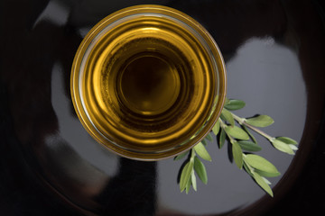 top view of container with extra virgin olive oil
