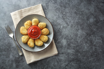Chicken nuggets with ketchup. Fast food. Copy space.