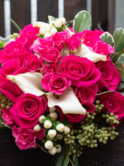 Wedding bouquet of Yak crimson roses. Copy space.