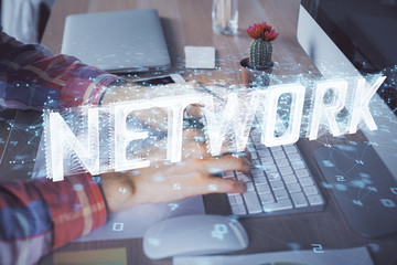 Businessman with computer background with technology theme hologram. Concept of big data. Double exposure.