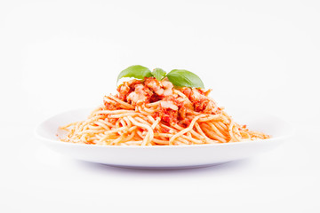 Spaghetti bolognese with melted parmesan cheese decorated with basil on a white background	