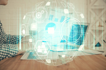 Social network theme hologram with businessman working on computer on background. Concept of world wide web. Multi exposure.