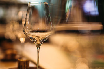 Empty wine glasses closeup. In a row, focus on foreground