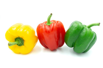 three peppers isolated on white background