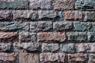 Background, texture from a multi-colored natural stone