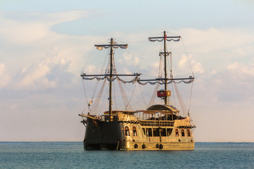 Old boat on the amazing water in the Indian ocean