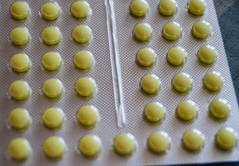 small yellow pills tablets blaster