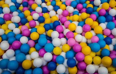 Fototapeta na wymiar multicolored bright balls swimming pool