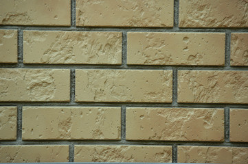 Aged, damaged brickwork texture with stripes.