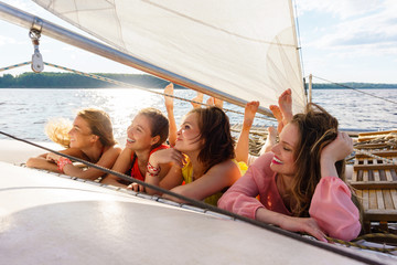 young women relax on a sailing yacht