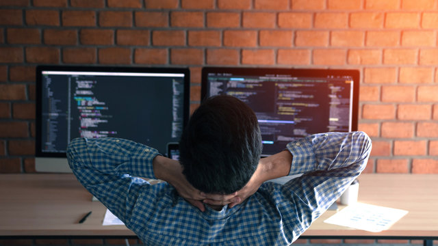 Software developers are relaxing from the hard work at his office.