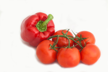 tomatoes and capsicum isolated on white background