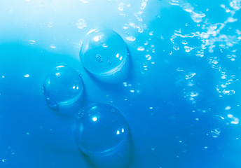 Beautiful abstract close up blue and purple bubbles water background and wallpaper