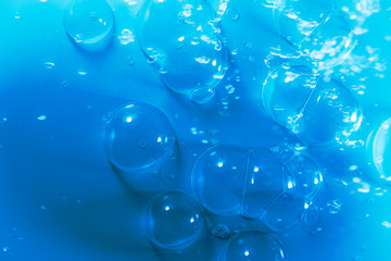 Beautiful abstract close up blue and purple bubbles water background and wallpaper