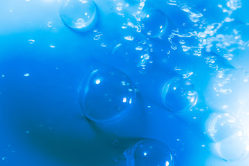 Beautiful abstract close up blue and purple bubbles water background and wallpaper