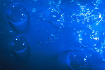 Beautiful abstract close up blue and purple bubbles water background and wallpaper