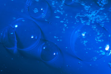 Beautiful abstract close up blue and purple bubbles water background and wallpaper