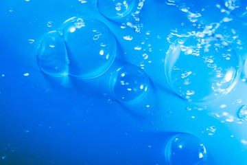 Beautiful abstract close up blue and purple bubbles water background and wallpaper