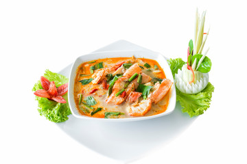 Tom Yum Koong (Thai Language) is prawn and lemon grass soup with mushrooms the famous delicious Thai food on whhite background