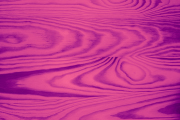 Fototapeta premium Abstract violet wooden desk background. Fancy pink board backdrop.