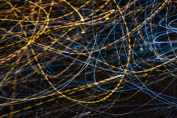 Speed light trails at night, long exposure abstract urban background