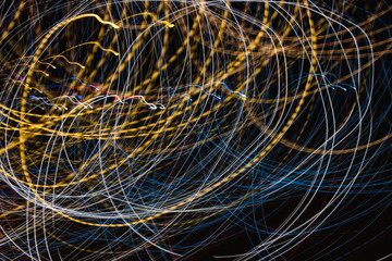 Speed light trails at night, long exposure abstract urban background