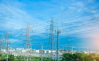 High voltage electric tower line. Silhouette of Power Supply Facilities with blue sky background. transmission tower.