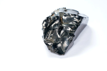 A black rock that consists mainly of carbon and was photographed in top quality .