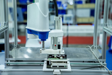 automation machine and detail close up in machine automatic with robotic automation technology for technology production factory