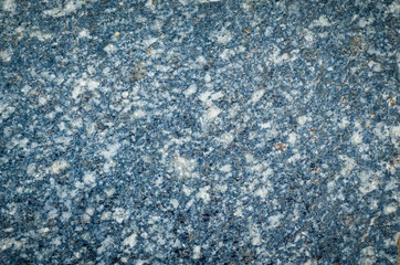 Surface of a granite stone, texture background