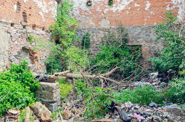 Garbage dump in the old destroyed building, environmental protection