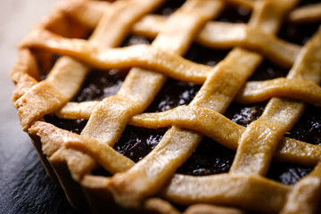Close up of Homemade rustic pastry Traditional Raisin Pie.