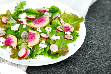 Fresh Watermelon Radish salad. Vegan, vegetarian, clean eating, dieting, food concept.