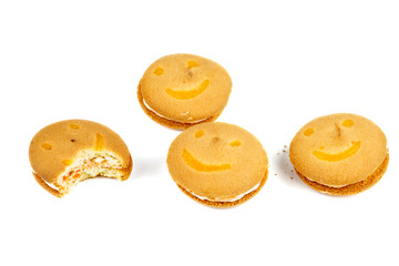 Smiling butter cookies isolated on white background