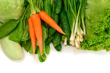 Fresh green vegetables and herbs isolated on white background. Space for text or design.