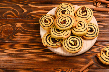 Home made baked cookies with raisins and poppy seeds. Space for text or design.