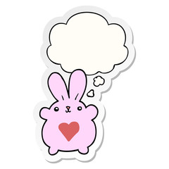 cute cartoon rabbit with love heart and thought bubble as a printed sticker
