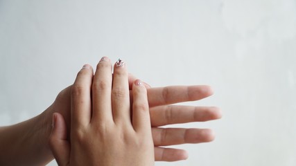 hands on black background