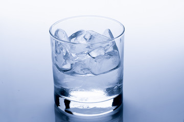 Ice cube melts in studio: Global warming concept