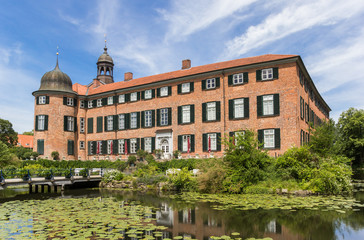 Fototapeta na wymiar Pond and historic castle in Eutin, Germany