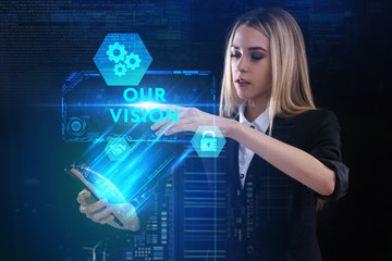 The concept of business, technology, the Internet and the network. A young entrepreneur working on a virtual screen of the future and sees the inscription: Our vision