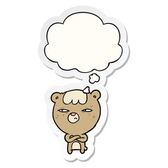 cartoon angry bear and thought bubble as a printed sticker