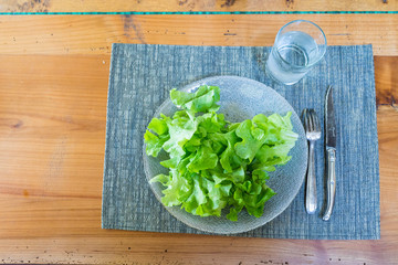 fresh vegetables and salad on wooden table