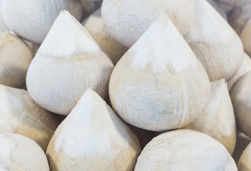 Fresh peeled coconut juice,ready for open drink sale at fruit market,healthy food,sweet taste and good smell