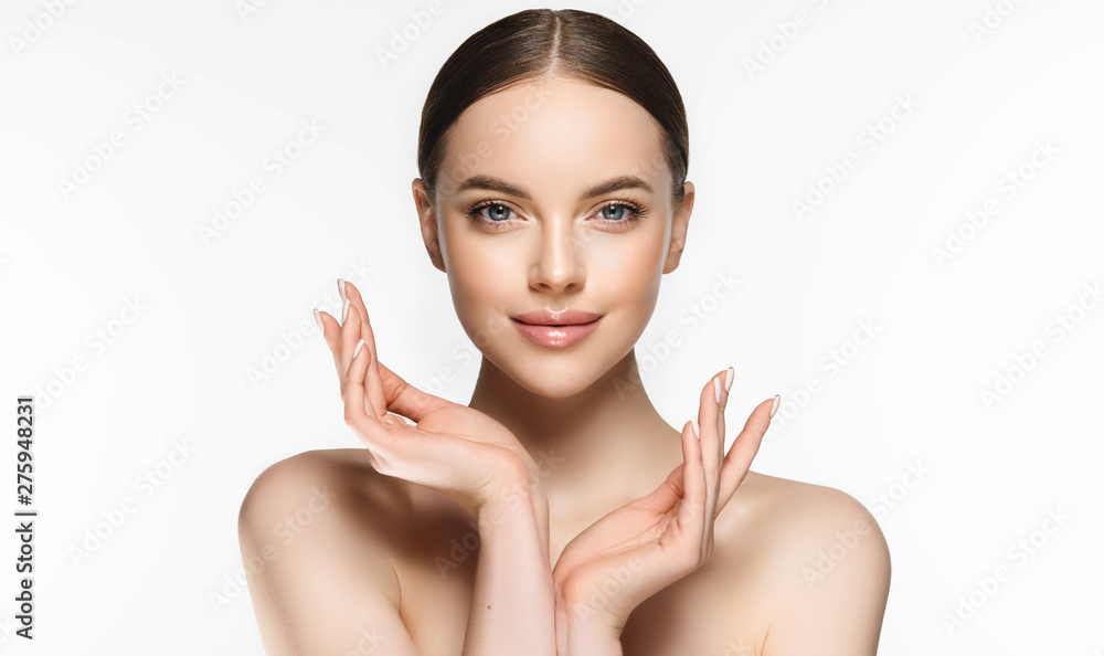 Wall mural beautiful young woman with clean fresh skin . facial treatment . cosmetology , beauty and spa . nice