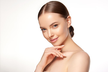 Beautiful Young Woman with Clean Fresh Skin . Facial  treatment   . Cosmetology , beauty  and spa ....