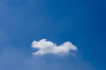 White clouds in the blue sky and blue.