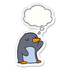 cartoon penguin and thought bubble as a printed sticker