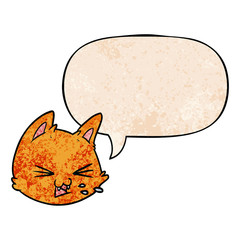 spitting cartoon cat face and speech bubble in retro texture style
