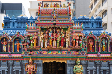 Colourful statues of Hindu religious deities adorning the entrance of a Hindu temple in Singapore